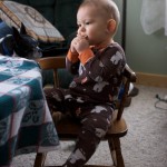 Look at him sitting in that chair feeding himself! (with Boston the clean-up crew close by :)) Look at him sitting in that chair feeding himself! (with Boston the clean-up crew close by :))