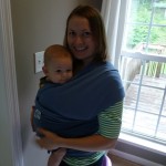 Still sporting the Moby wrap.  Look at those chubby legs hanging out!!